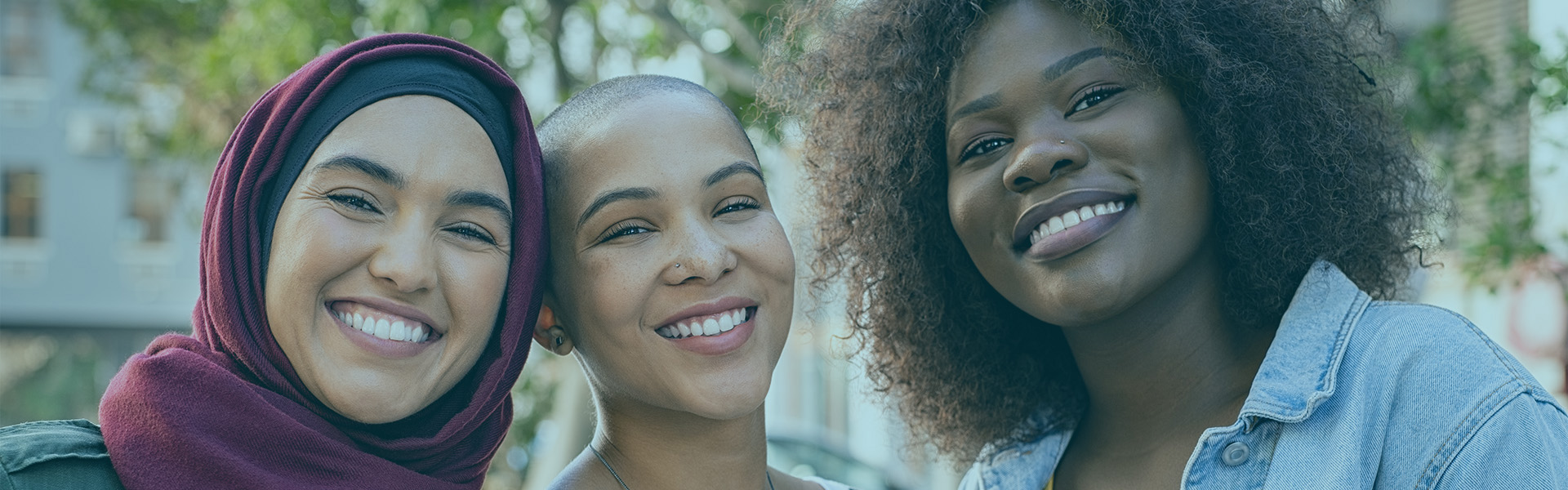 Three women community involvement