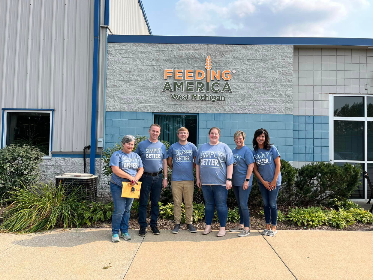 West Michigan Credit Union team members volunteering at Feeding America.