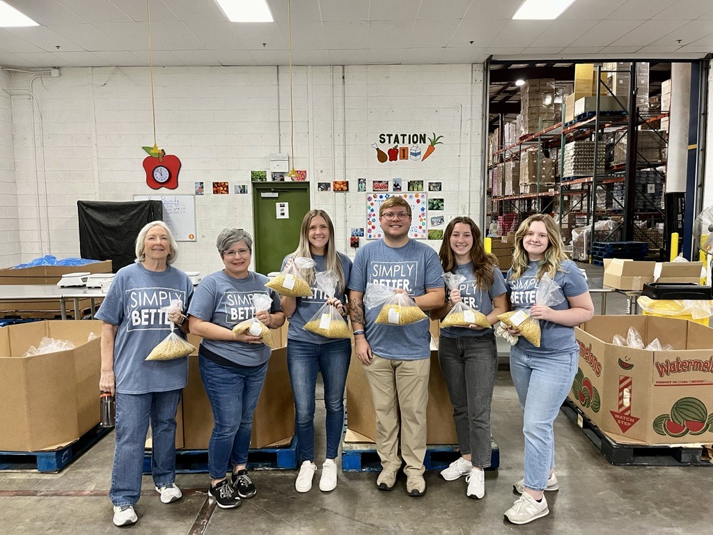 West Michigan Credit Union team members volunteering at Feeding America.