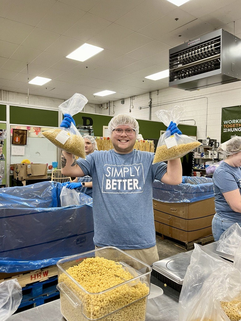 West Michigan Credit Union team member volunteering at Feeding America.