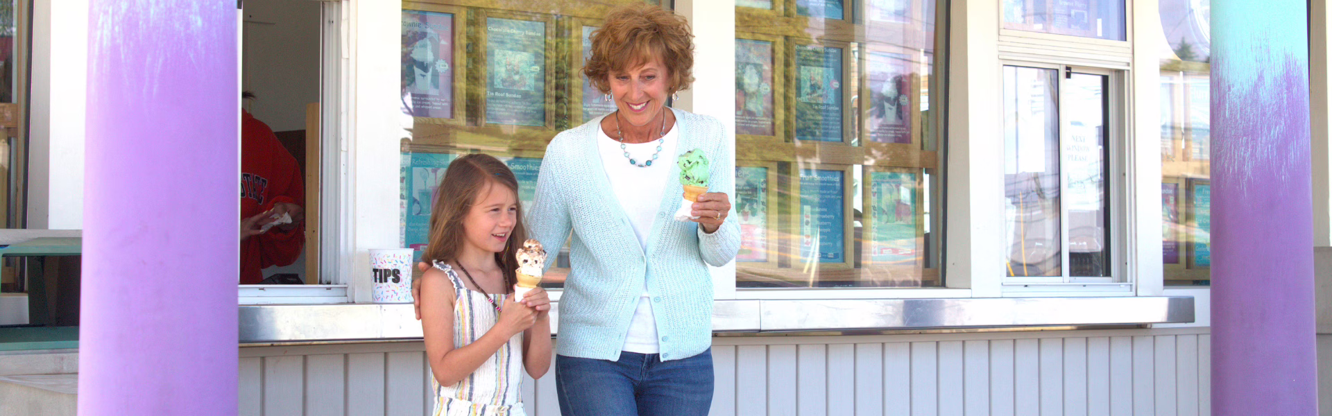 Financial Planning - Grandma and granddaughter eating ice cream