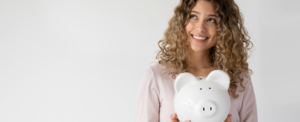 Woman Holding a Piggy Bank - Newsletter