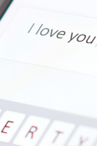 Text message that reads "I love you".
