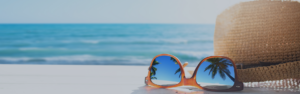 Sunglasses on Beach | Skip-A-Pay