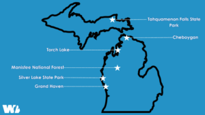 Blue infographic of all six Michigan travel destinations marked on the Michigan map