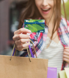 Woman showing credit card